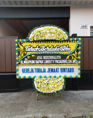Papan Bunga Duka di Tering