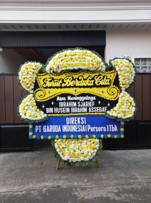 Papan Bunga Duka di Tering