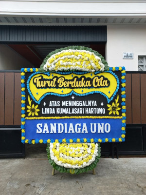 Papan Bunga Duka di Tering